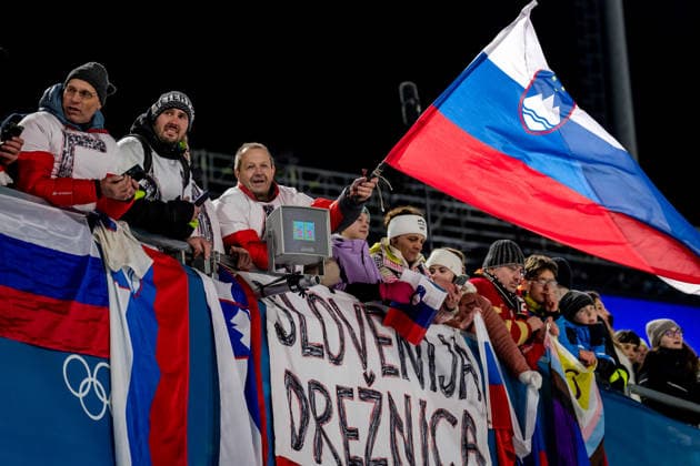 OLYMPICS - Winter Olympic Games, Olympische Spiele, Olympia, OS Milano Cortina 2026 PREDAZZO,ITALY,10.FEB.26 - OLYMPICS, Ski jumping, Skispringen, Ski, nordisch - Winter Olympic Games Milano Cortina 2026, normal hill, mixed team. Image shows fans of Slovenia.  GEPAxpictures xMatthiasxTrinkl