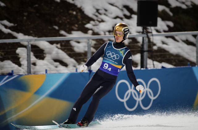Olympische Winterspiele, Olympia, Skispringen, Mixed Team, Normalschanze, Val di Fiemme, Predazzo, Olympiaschanze RAIMUND Philipp (GER) beim Ausfahren im Auslauf *** Olympic Winter Games, Olympics, Ski Jumping, Mixed Team, Normal Hill, Val di Fiemme, Predazzo, Olympic Hill RAIMUND Philipp GER on the outrun in the outrun