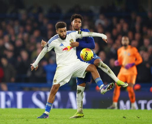 London, England, 10th February 2026. Jayden Bogle of Leeds United and Estevao of Chelsea during the Chelsea vs Leeds United Premier League match at Stamford Bridge, London. Picture credit should read: Paul Terry Sportimage EDITORIAL USE ONLY. No use with unauthorised audio, video, data, fixture lists, club league logos or live services. Online in-match use limited to 120 images, no video emulation. No use in betting, games or single club league player publications. SPI_042_PT_Chelsea_v_Leeds_United SPI-4517-0042