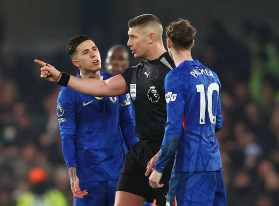 London, England, 10th February 2026. Enzo Fernandez and Cole Palmer of Chelsea questions referee Robert Jones during the Chelsea vs Leeds United Premier League match at Stamford Bridge, London. Picture credit should read: Paul Terry Sportimage EDITORIAL USE ONLY. No use with unauthorised audio, video, data, fixture lists, club league logos or live services. Online in-match use limited to 120 images, no video emulation. No use in betting, games or single club league player publications. SPI_046_PT_Chelsea_v_Leeds_United SPI-4517-0046