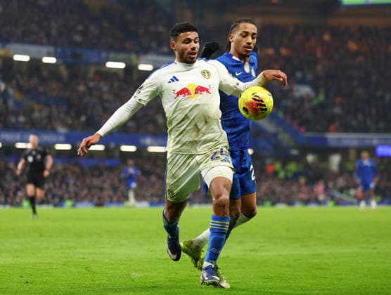 London, England, 10th February 2026. James Justin of Leeds United tussles with Joao Pedro of Chelsea during the Chelsea vs Leeds United Premier League match at Stamford Bridge, London. Picture credit should read: Paul Terry Sportimage EDITORIAL USE ONLY. No use with unauthorised audio, video, data, fixture lists, club league logos or live services. Online in-match use limited to 120 images, no video emulation. No use in betting, games or single club league player publications. SPI_047_PT_Chelsea_v_Leeds_United SPI-4517-0047