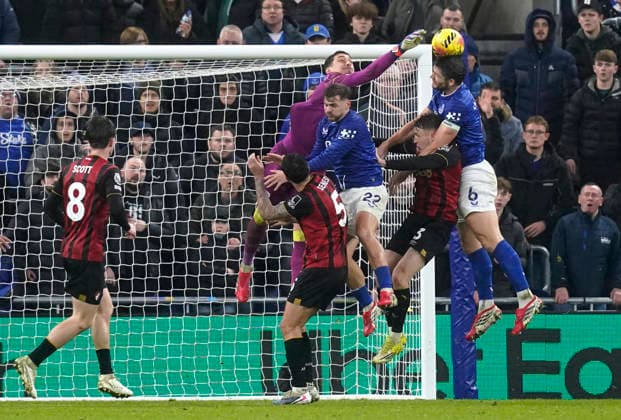 Liverpool, England, 10th February 2026. Djordje Petrovic of Bournemouth blocks a header from James Tarkowski of Everton during the Everton vs AFC Bournemouth Premier League match at Hill Dickinson Stadium, Liverpool. Picture credit should read: Andrew Yates Sportimage EDITORIAL USE ONLY. No use with unauthorised audio, video, data, fixture lists, club league logos or live services. Online in-match use limited to 120 images, no video emulation. No use in betting, games or single club league player publications. SPI_057_AY_Everton_Leeds SPI-4516-0054