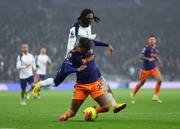 10th February 2026; Tottenham Hotspur Stadium, London, England; Premier League Football, Tottenham Hotspur versus Newcastle United; Anthony Elanga of Newcastle United challenged by Djed Spence of Tottenham Hotspur  JohnxPatrickxFletcher Content restricted for UK based newspaper