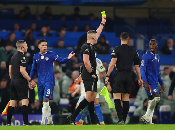 London, England, 10th February 2026. Moises Caicedo of Chelsea (r) is yellow carded during the Chelsea vs Leeds United Premier League match at Stamford Bridge, London. Picture credit should read: Paul Terry Sportimage EDITORIAL USE ONLY. No use with unauthorised audio, video, data, fixture lists, club league logos or live services. Online in-match use limited to 120 images, no video emulation. No use in betting, games or single club league player publications. SPI_056_PT_Chelsea_v_Leeds_United SPI-4517-0059