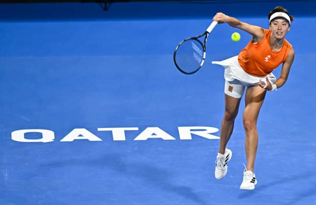 WTA, Tennis Damen Qatar TotalEnergies Open 2026-round of 32 in Doha - 10 Feb 2026 Xinyu Wang of China plays against Elena Rybakina of Kazakhstan (not in view) during their round of 32 match at the WTA Qatar TotalEnergies Open 2026 tennis tournament at the Khalifa International Tennis Complex. Elena Rybakina won against Xinyu Wang 6-2,6-4. ?? Doha Qatar Copyright: xNoushadxVariyattiyakkalx xSOPAxImagesx NVRITYAKAL4-003