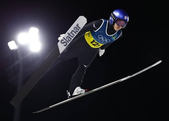 Milan Cortina Olympics: Ski jumping, Skispringen, Ski, nordisch Japanese ski jumper Sara Takanashi competes en route to winning the mixed team bronze at the Milan Cortina Olympics on Feb. 10, 2026, at Predazzo Ski Jumping Stadium in Predazzo, Italy.  A14AA0005268230P