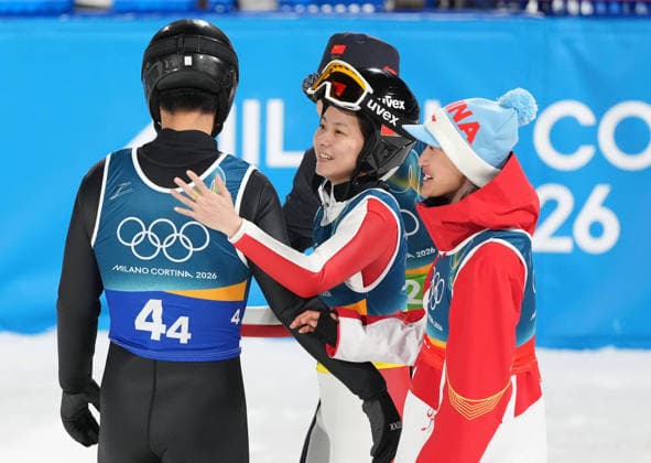 260210 -- PREDAZZO, Feb. 10, 2026 -- Athletes of China react after the Ski jumping, Skispringen, Ski, nordisch mixed team match at the Milan-Cortina 2026 Olympic Winter games, Winterspiele,Spiele, Summer games in Predazzo, Italy, Feb. 10, 2026. MICO2026ITALY-PREDAZZO-OLYMPIC WINTER GAMES-SKI JUMPING-MIXED TEAM MengxYongmin  (MICO2026)ITALY-PREDAZZO-OLYMPIC WINTER GAMES-SKI JUMPING-MIXED TEAM IMAGO MengxYongmin  imago images 0847274512