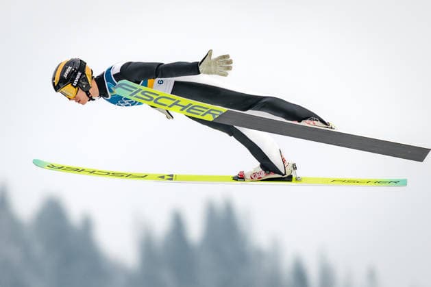 OLYMPICS - Winter Olympic Games, Olympische Spiele, Olympia, OS Milano Cortina 2026 PREDAZZO,ITALY,11.FEB.26 - OLYMPICS, NORDIC SKIING, NORDIC COMBINED, Ski jumping, Skispringen, Ski, nordisch - Winter Olympic Games Milano Cortina 2026, normal hill, men. Image shows Zihe Zhao (CHN).  GEPAxpictures xMatthiasxTrinkl