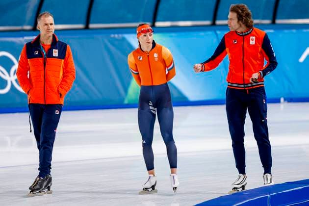 coach Dennis van der Gun of TeamNL and coach Gerard van Velde of TeamNL talks with Femke Kok of the Netherlands Training and Practice, Milano Cortina 2026 Winter Olympics: Day 5, Speed skating, Eisschnelllauf - Milano Cortina 2026 Winter Olympics: Day 5, Milano Speed Skating Stadium, February 11, 2026, Milan, Italy.
