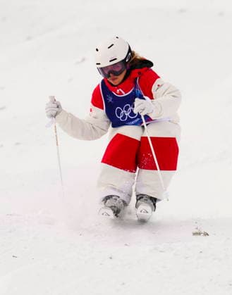 February 11, 2026, Livigno, Italy: Canada s Ashley Koehler, from Lac-Beauport, Que., competes in the women s moguls qualification two at the Milano Cortina 2026 Winter Olympic Games, Olympische Spiele, Olympia, OS in Livigno, Italy on Wednesday, Feb. 11, 2026. Canada News - February 11, 2026  - ZUMAc35_ 20260211_zaf_c35_003 Copyright: xSeanxKilpatrickx