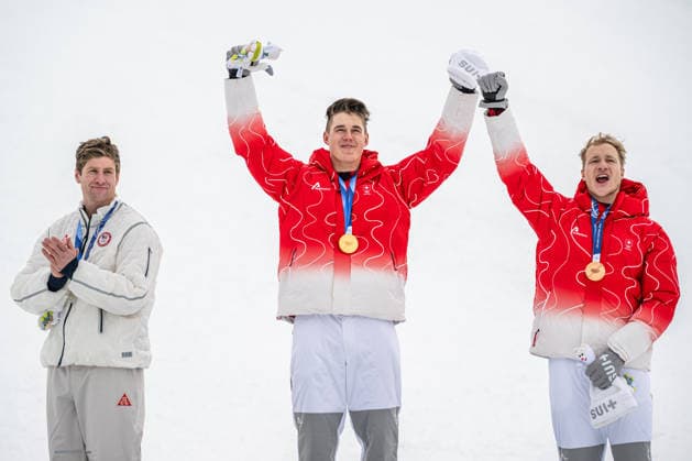 XXV Winter Olympic Games, Olympische Spiele, Olympia, OS in Bormio, Italy, on February 11, 2026. Men s super-G race. From left second Ryan Cochran-Siegle of USA, winner Franjo von Allmen of Switzerland, third Marco Odermatt of Switzerland (CTKxPhoto DavidxTanecek) CTKPhotoP2026021105318  CTKPhotoP2026021105318