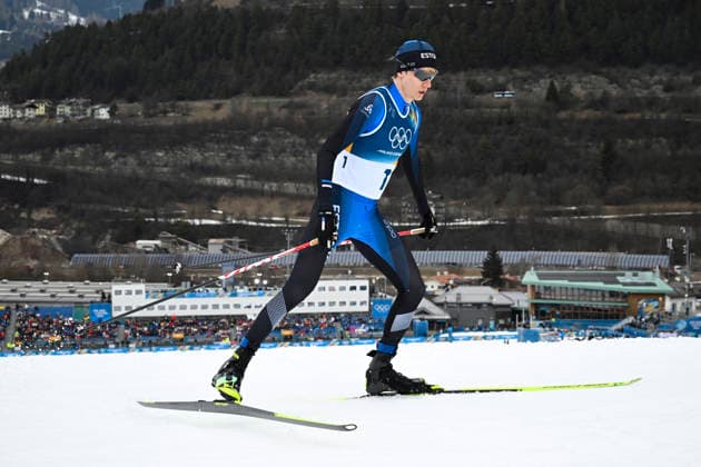 Kristjan Ilves of Estonia competes in the cross-country competition of the men s Nordic Combined Individual Gundersen NH 10 km event at the Tesero Cross-country Skiing Stadium at the Milano Cortina Winter Olympics on February 11, 2026. - MARKKU ULANDER Tesero Italy _WdD505iUQI  Copyright: xMarkkuxUlanderx _WdD505iUQI