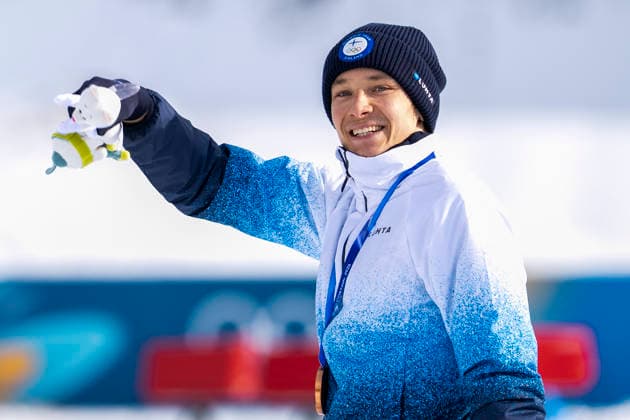 Nordic Combined - Milano Cortina 2026 Winter Olympics Day 5 Bronze medallist Eero Hirvonen of Team Finland celebrates on the podium biting his medal following the nordic combined individual Gundersen normal hill 10km event at Tesero Cross Country Stadium at Lago di Tesero (Val di Fiemme) during the Milano Cortina 2026 Winter Olympic Games, Olympische Spiele, Olympia, OS on February 11, 2026 Predazzo Italy  Copyright: xAndrzejxIwanczukx originalFilename:iwanczuk-nordicco260211_np9CC.jpg