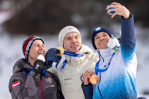 Nordic Combined - Milano Cortina 2026 Winter Olympics Day 5 Gold medalist Jens Luraas Oftebro of Team Norway, Silver medalist Johannes Lamparter of Team Austria and Bronze medalist Eero Hirvonen of Team Finland pose for a photo by taking a victory selfie on the podium during the medal ceremony for the Nordic Combined Individual Gundersen Normal Hill 10km on day five of the Milano Cortina 2026 Winter Olympic Games, Olympische Spiele, Olympia, OS at Tesero Cross-Country Stadium on February 11, 2026 in Val di Fiemme, Italy. Predazzo Italy  Copyright: xAndrzejxIwanczukx originalFilename:iwanczuk-nordicco260211_np1rn.jpg