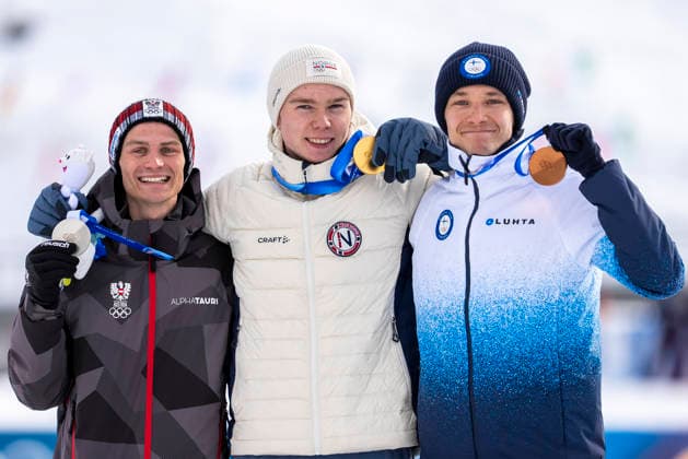 Nordic Combined - Milano Cortina 2026 Winter Olympics Day 5 Gold medalist Jens Luraas Oftebro of Team Norway, Silver medalist Johannes Lamparter of Team Austria and Bronze medalist Eero Hirvonen of Team Finland pose for a photo by taking a victory selfie on the podium during the medal ceremony for the Nordic Combined Individual Gundersen Normal Hill 10km on day five of the Milano Cortina 2026 Winter Olympic Games, Olympische Spiele, Olympia, OS at Tesero Cross-Country Stadium on February 11, 2026 in Val di Fiemme, Italy. Predazzo Italy  Copyright: xAndrzejxIwanczukx originalFilename:iwanczuk-nordicco260211_np4t4.jpg