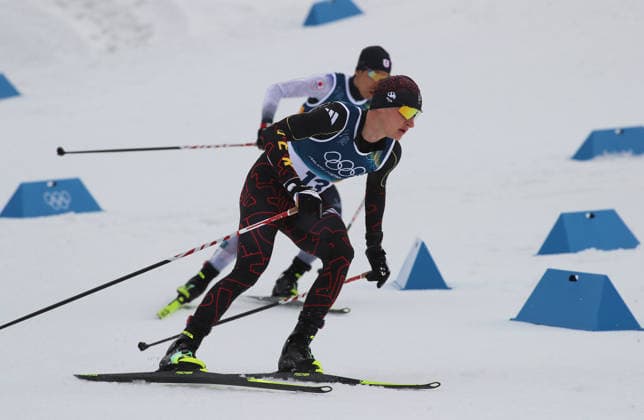 Olympische Winterspiele, Olympia, Nordische Kombination, Individual Gundersen Normal Hill 10km, Langlauf, Val di Fiemme, Tesero SCHMID Julian (GER) in der Loipe beim Langlauf, Abfahrt, weicher Schnee *** Olympic Winter Games, Olympic Games, Nordic Combined, Individual Gundersen Normal Hill 10km, cross-country skiing, Val di Fiemme, Tesero SCHMID Julian GER in the cross-country skiing track, downhill, soft snow