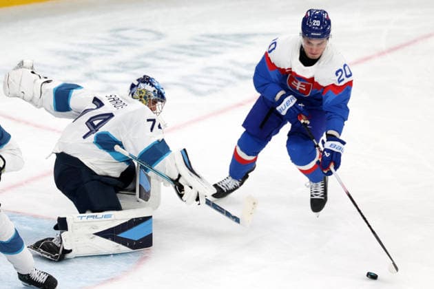 Milano Cortina 2026, Milan, Italy, 11.02, 2026, MiCo2026, MiCo, 2026, Olympics, Olympic, Winter Olympic, Olympic Winter games, Winterspiele,Spiele, Summer games Ice hockey, Eishockey Finland, Slovakia Juraj Slafkovsky of Slovakia and Juuse Saros of Finland in action during Men™s Premilinary round Group B Ice Hockey match between Slovakia and Finland teams of Milano Cortina 2026 Olympic Winter Games in Milan, Italy, 11.02.2026. Photo: Roman Koksarov (RKF) Milan Italy Copyright: xRomanxKoksarovx 0B4A0308.JPG