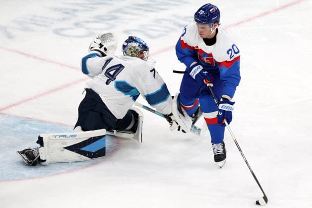 Milano Cortina 2026, Milan, Italy, 11.02, 2026, MiCo2026, MiCo, 2026, Olympics, Olympic, Winter Olympic, Olympic Winter games, Winterspiele,Spiele, Summer games Ice hockey, Eishockey Finland, Slovakia Juraj Slafkovsky of Slovakia and Juuse Saros of Finland in action during Men™s Premilinary round Group B Ice Hockey match between Slovakia and Finland teams of Milano Cortina 2026 Olympic Winter Games in Milan, Italy, 11.02.2026. Photo: Roman Koksarov (RKF) Milan Italy Copyright: xRomanxKoksarovx 0B4A0308.JPG