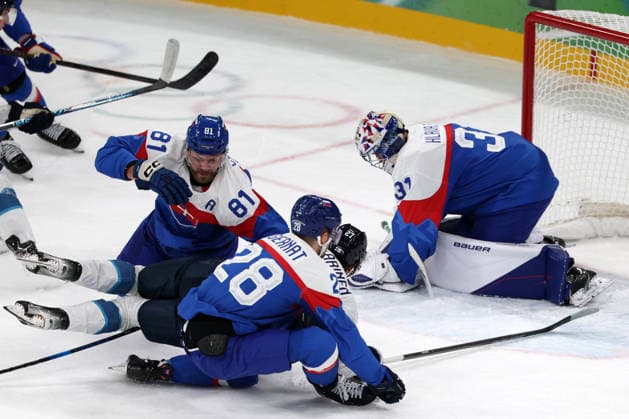 Milano Cortina 2026, Milan, Italy, 11.02, 2026, MiCo2026, MiCo, 2026, Olympics, Olympic, Winter Olympic, Olympic Winter games, Winterspiele,Spiele, Summer games Ice hockey, Eishockey Finland, Slovakia Samuel Hlavaj, Martin Gernat, Erik Cernak of Slovakia and Eetu Luostarinen of Finland in action during Men™s Premilinary round Group B Ice Hockey match between Slovakia and Finland teams of Milano Cortina 2026 Olympic Winter Games in Milan, Italy, 11.02.2026. Photo: Roman Koksarov (RKF) Milan Italy Copyright: xRomanxKoksarovx 0B4A0436.JPG