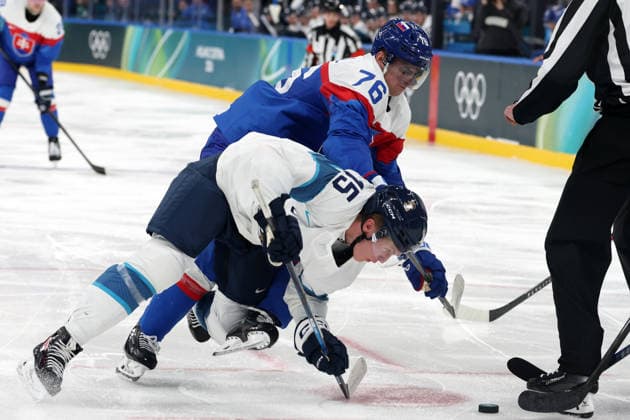 Milano Cortina 2026, Milan, Italy, 11.02, 2026, MiCo2026, MiCo, 2026, Olympics, Olympic, Winter Olympic, Olympic Winter games, Winterspiele,Spiele, Summer games Ice hockey, Eishockey Finland, Slovakia Martin Pospisil of Slovakia and Anton Lundell of Finland in action during Men™s Premilinary round Group B Ice Hockey match between Slovakia and Finland teams of Milano Cortina 2026 Olympic Winter Games in Milan, Italy, 11.02.2026. Photo: Roman Koksarov (RKF) Milan Italy Copyright: xRomanxKoksarovx 0B4A0645.JPG