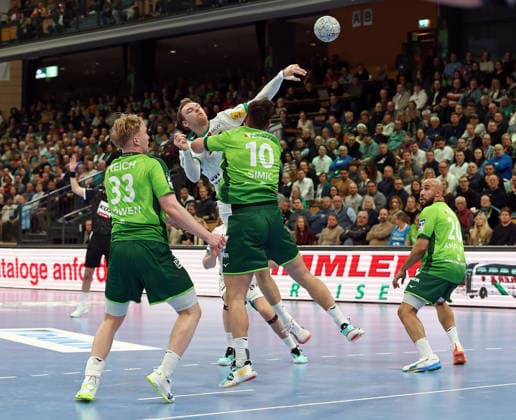 11.02.2026, xovx, Handball Daikin Handball Bundesliga, HSG Wetzlar - Füchse Berlin v.l. Georg Löwen (HSG Wetzlar), Mathias Gidsel (Füchse Berlin), Josip Simic (HSG Wetzlar), Cyrill Akakpo (HSG Wetzlar) Wetzlar Buderus-Arena Hessen Deutschland (DE)