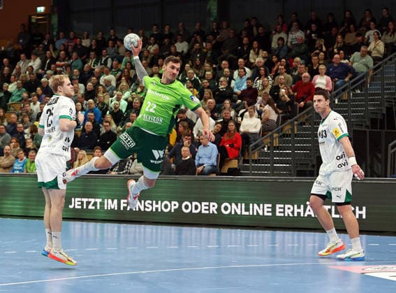 11.02.2026, xovx, Handball Daikin Handball Bundesliga, HSG Wetzlar - Füchse Berlin v.l. Matthes Langhoff (Füchse Berlin), Jona Schoch (HSG Wetzlar), Mihajlo Marsenic (Füchse Berlin) Wetzlar Buderus-Arena Hessen Deutschland (DE)