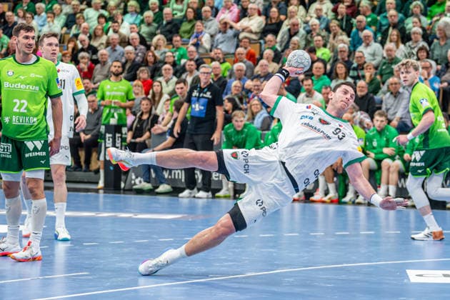 Handball Bundesliga; HSG Wetzlar - Füchse Berlin, 11.02.26 Mijajlo Marseni? (Füchse Berlin, 93), Jona Schoch (HSG Wetzlar, 22) Handball Bundesliga; HSG Wetzlar - Füchse Berlin: Wetzlar, 11.02.26 Copyright: xBEAUTIFULxSPORTS Roeczeyx