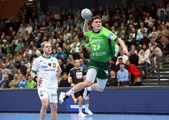 11.02.2026, xovx, Handball Daikin Handball Bundesliga, HSG Wetzlar - Füchse Berlin v.l. Matthes Langhoff (Füchse Berlin), Phil Spandau (HSG Wetzlar) Wetzlar Buderus-Arena Hessen Deutschland (DE)