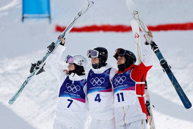 (260211) -- LIVIGNO, Feb. 11, 2026 -- Gold medalist Elizabeth Lemley (C) of the United States, silver medalist Jaelin Kauf (L) of the United States and bronze medalist Perrine Laffont of France celebrate after the freestyle skiing women s moguls final at the Milan-Cortina 2026 Olympic Winter games, Winterspiele,Spiele, Summer games in Livigno, Italy, Feb. 11, 2026. ) (MICO2026)ITALY-LIVIGNO-OLYMPIC WINTER GAMES-FREESTYLE SKIING WOMEN S MOGULS-FINAL WangxPeng 
