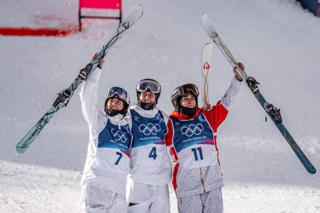 (260211) -- LIVIGNO, Feb. 11, 2026 -- Gold medalist Elizabeth Lemley (C) of the United States, silver medalist Jaelin Kauf (L) of the United States and bronze medalist Perrine Laffont of France celebrate during the awarding ceremony after the freestyle skiing women s moguls final at the Milan-Cortina 2026 Olympic Winter games, Winterspiele,Spiele, Summer games in Livigno, Italy, Feb. 11, 2026. ) (MICO2026)ITALY-LIVIGNO-OLYMPIC WINTER GAMES-FREESTYLE SKIING WOMEN S MOGULS-FINAL HuxChao 