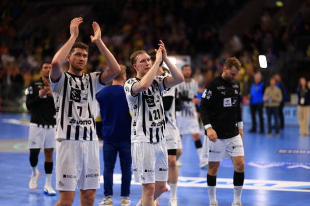 RECORD DATE NOT STATED Szene mit Magnus Landin (7; THW Kiel), Eric Johansson (21; THW Kiel) und Tim Nothdurft (28; Rhein Neckar Löwen) Rhein Neckar Löwen vs THW Kiel