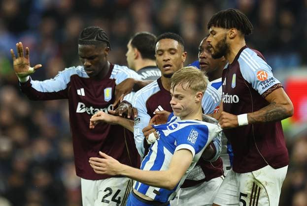 Jan Paul van Hecke of Brighton & Hove Albion is pulled by Tyrone Mings of Aston Villa Aston Villa v Brighton and Hove Albion, Premier League, Football, Villa Park, Birmingham, UK - 11 Feb 2026Birmingham Villa Park United Kingdom EDITORIAL USE ONLY No use with unauthorised audio, video, data, fixture lists, club league logos or live services. Online in-match use limited to 120 images, no video emulation. No use in betting, games or single club league player publications. Copyright: xMichaelxZemanek Shutterstockx 16540332w
