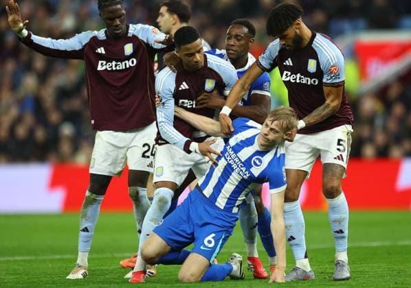 Jan Paul van Hecke of Brighton & Hove Albion is pulled by Tyrone Mings of Aston Villa Aston Villa v Brighton and Hove Albion, Premier League, Football, Villa Park, Birmingham, UK - 11 Feb 2026Birmingham Villa Park United Kingdom EDITORIAL USE ONLY No use with unauthorised audio, video, data, fixture lists, club league logos or live services. Online in-match use limited to 120 images, no video emulation. No use in betting, games or single club league player publications. Copyright: xMichaelxZemanek Shutterstockx 16540332x