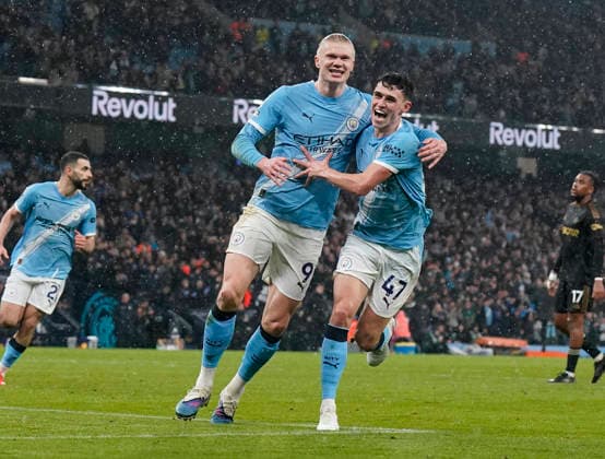 Manchester, England, 11th February 2026. Erling Haaland of Manchester City celebrates after scoring the third goal with Phil Foden of Manchester City during the Manchester City vs Fulham Premier League match at the Etihad Stadium, Manchester. Picture credit should read: Andrew Yates Sportimage EDITORIAL USE ONLY. No use with unauthorised audio, video, data, fixture lists, club league logos or live services. Online in-match use limited to 120 images, no video emulation. No use in betting, games or single club league player publications. SPI_015_AY_MAN_CITY_FULHAM SPI-4519-0016