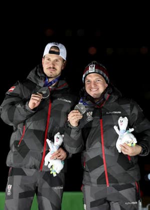 OLYMPICS - Winter Olympic Games, Olympische Spiele, Olympia, OS Milano Cortina 2026 CORTINA D AMPEZZO,ITALY,11.FEB.26 - OLYMPICS, LUGE - Winter Olympic Games Milano Cortina 2026, men, doubles, medal ceremony. Image shows the rejoicing of Thomas Steu and Wolfgang Kindl (AUT).  GEPAxpictures xMaticxKlansek