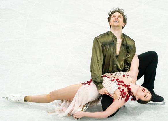 Christina Carreira and Anthony Ponomarenko of United States compete during the Ice Dance - Free Dance competition at the Milano Ice Skating Arena in Milan, Italy, on Wednesday, February 11, 2026.  OLY20260211417 RICHARDxELLIS