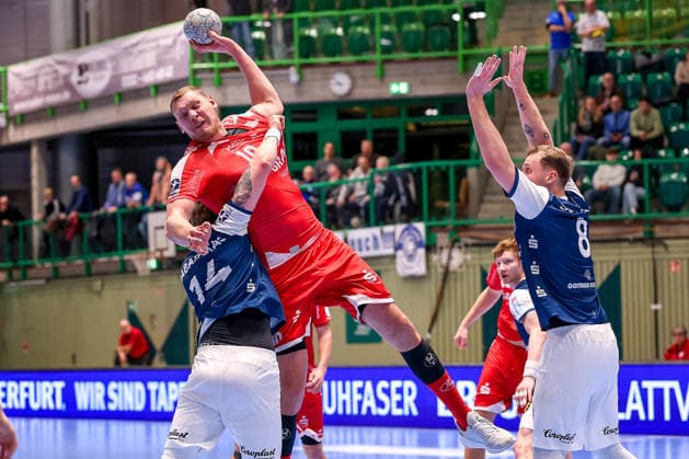 11.02.2026, Handball, 1.HBL, Bergischer HC - MT Melsungen, 20. Spieltag, Uni-Halle Wuppertal: Dainis Kristopans (Melsungen 10) im Zweikampf gegen Gerdas Babarskas (BHC 14) Nico Schöttle (BHC 08) Nordrhein-Westfalen Deutschland