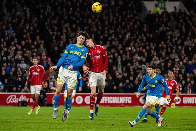 11th February 2026; The City Ground, Nottingham, England; Premier League Football, Nottingham Forest versus Wolverhampton Wanderers; Ladislav Krejci of Wolverhampton Wanderers wins an aerial duel with Elliot Anderson of Nottingham Forest  GodfreyxPitt Content restricted for UK based newspaper