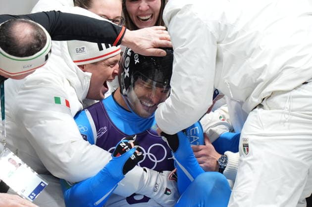 Italy s gold medalists Emanuel Rieder, and Simon Kainzwaldner, celebrate after the men s doubles luge competitions at the 2026 Winter Olympics, in Cortina d Ampezzo, Italy, Wednesday, Feb. 11, 2026. (Photo Spada LaPresse)  Copyright: xSpada LaPressex
