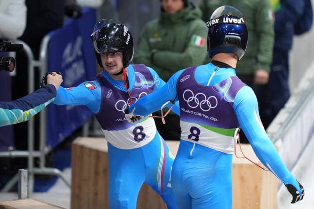 Italy s gold medalists Emanuel Rieder, and Simon Kainzwaldner, celebrate after the men s doubles luge competitions at the 2026 Winter Olympics, in Cortina d Ampezzo, Italy, Wednesday, Feb. 11, 2026. (Photo Spada LaPresse)  Copyright: xSpada LaPressex