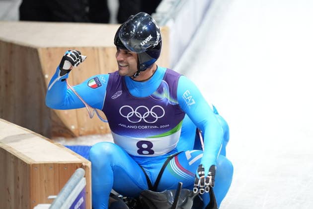 Italy s gold medalists Emanuel Rieder, and Simon Kainzwaldner, celebrate after the men s doubles luge competitions at the 2026 Winter Olympics, in Cortina d Ampezzo, Italy, Wednesday, Feb. 11, 2026. (Photo Spada LaPresse)  Copyright: xSpada LaPressex