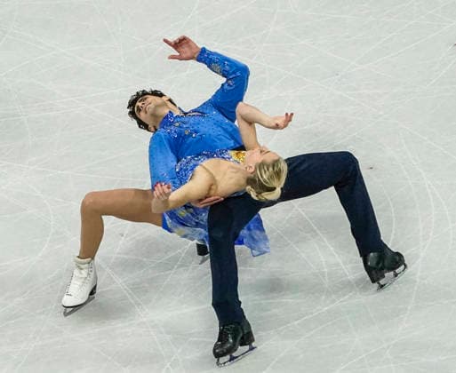 Piper Gilles and Paul Poirier of Canada compete during the Ice Dance - Free Dance competition at the Milano Ice Skating Arena in Milan, Italy, on Wednesday, February 11, 2026.  OLY20260211429 RICHARDxELLIS