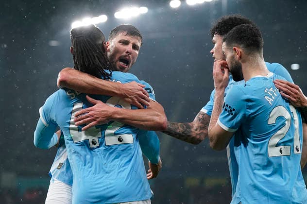 Manchester, England, 11th February 2026. Antoine Semenyo of Manchester City celebrates after scoring the opening goal with Ruben Dias of Manchester City during the Manchester City vs Fulham Premier League match at the Etihad Stadium, Manchester. Picture credit should read: Andrew Yates Sportimage EDITORIAL USE ONLY. No use with unauthorised audio, video, data, fixture lists, club league logos or live services. Online in-match use limited to 120 images, no video emulation. No use in betting, games or single club league player publications. SPI_046_AY_MAN_CITY_FULHAM SPI-4519-0046