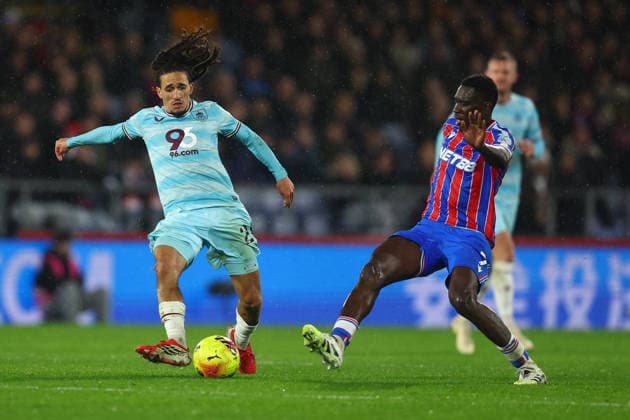 London, England, 11th February 2026. Hannibal Mejbri of Burnley and Ismaila Sarr of Crystal Palace challenge for the ball during the Crystal Palace vs Burnley Premier League match at Selhurst Park, London. Picture credit should read: Paul Terry Sportimage EDITORIAL USE ONLY. No use with unauthorised audio, video, data, fixture lists, club league logos or live services. Online in-match use limited to 120 images, no video emulation. No use in betting, games or single club league player publications. SPI_035_PT_Crystal_Palace_Burnley SPI-4518-0036
