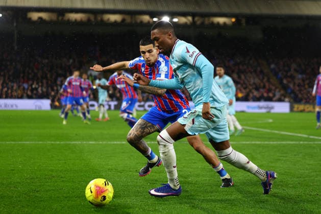 London, England, 11th February 2026. Daniel Munoz of Crystal Palace and Jaidon Anthony of Burnley challenge for the ball during the Crystal Palace vs Burnley Premier League match at Selhurst Park, London. Picture credit should read: Paul Terry Sportimage EDITORIAL USE ONLY. No use with unauthorised audio, video, data, fixture lists, club league logos or live services. Online in-match use limited to 120 images, no video emulation. No use in betting, games or single club league player publications. SPI_040_PT_Crystal_Palace_Burnley SPI-4518-0041
