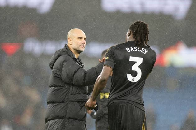 11th February 2026; Etihad Stadium, Manchester, Lancashire, England; Premier League Football, Manchester City versus Fulham; Manchester City manager Pep Guardiola and Calvin Bassey of Fulham after the game  RogerxEvans Content restricted for UK based newspaper