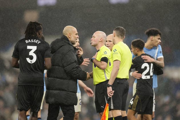 11th February 2026; Etihad Stadium, Manchester, Lancashire, England; Premier League Football, Manchester City versus Fulham; Manchester City manager Pep Guardiola speaks with referee Paul Tierney after the game  RogerxEvans Content restricted for UK based newspaper