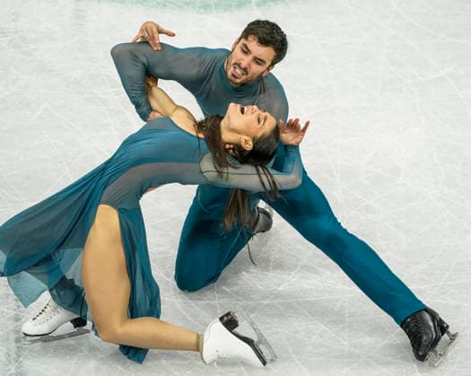 Laurence Fournier Beaudry and Guillaume Cizeron of France compete during the Ice Dance - Free Dance competition at the Milano Ice Skating Arena in Milan, Italy, on Wednesday, February 11, 2026.  OLY20260211432 RICHARDxELLIS