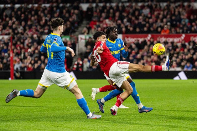 11th February 2026; The City Ground, Nottingham, England; Premier League Football, Nottingham Forest versus Wolverhampton Wanderers; Morgan Gibbs-White of Nottingham Forest flicks the ball over Mateus Mane of Wolverhampton Wanderers  GodfreyxPitt Content restricted for UK based newspaper