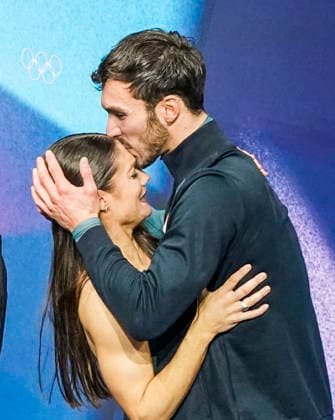 Laurence Fournier Beaudry and Guillaume Cizeron of France celebrate their gold medal win in the Ice Dance - Free Dance competition at the Milano Ice Skating Arena in Milan, Italy, on Wednesday, February 11, 2026.  OLY20260211435 RICHARDxELLIS